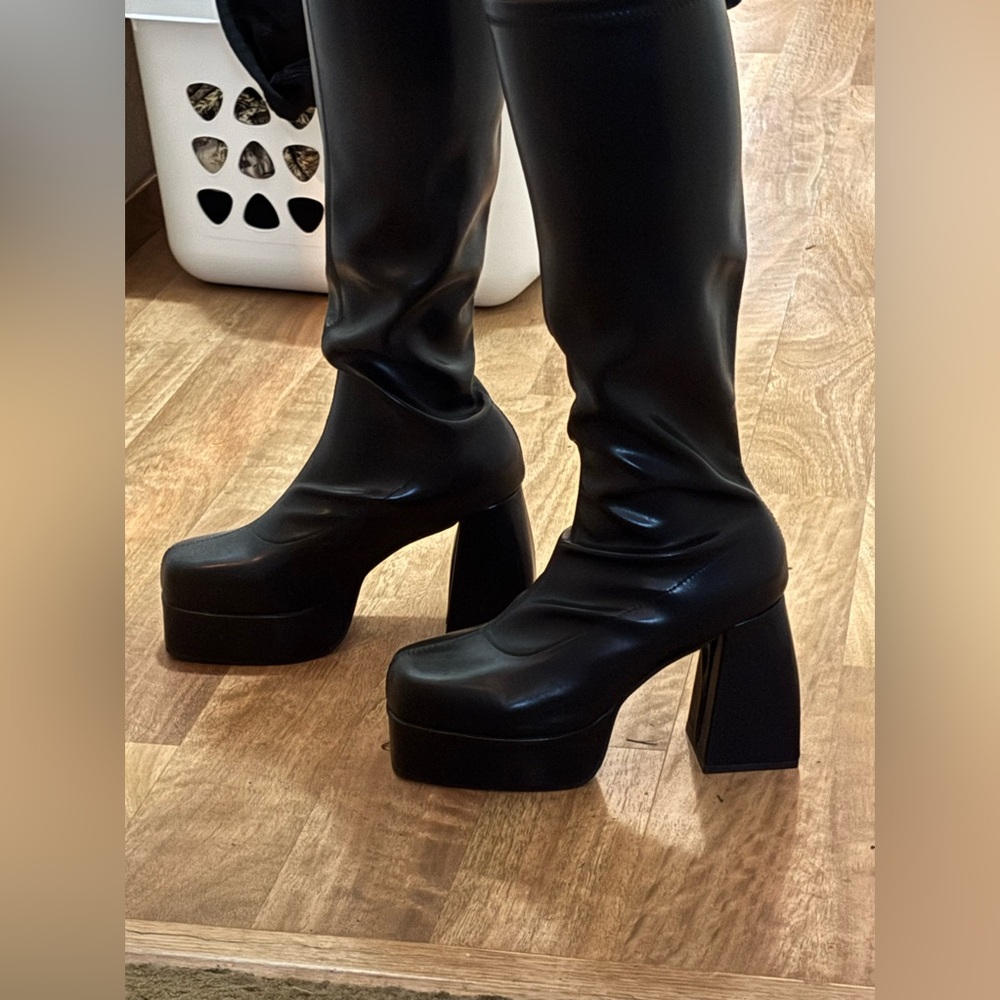 Leather boots. Never used. I bought them for a Halloween costume.